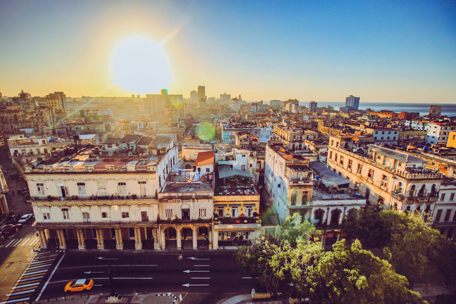 Havana, Cuba, at golden hour, the old city and rooftops stretching toward the sea
